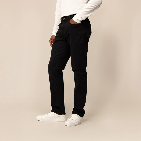 Man wearing Marame Straight Leg Denim Jeans in Black, front view. |black denim