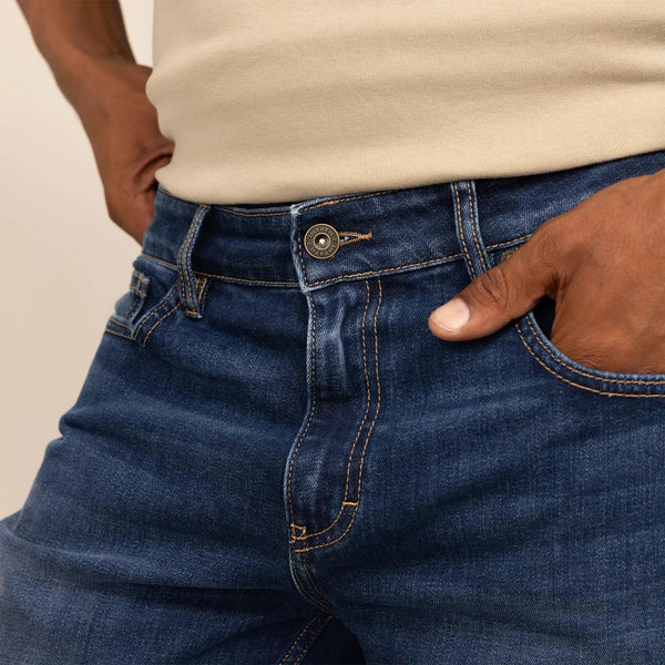 Man wearing Straight Leg Denim Jeans in Navy Wash, closeup. |navy wash denim