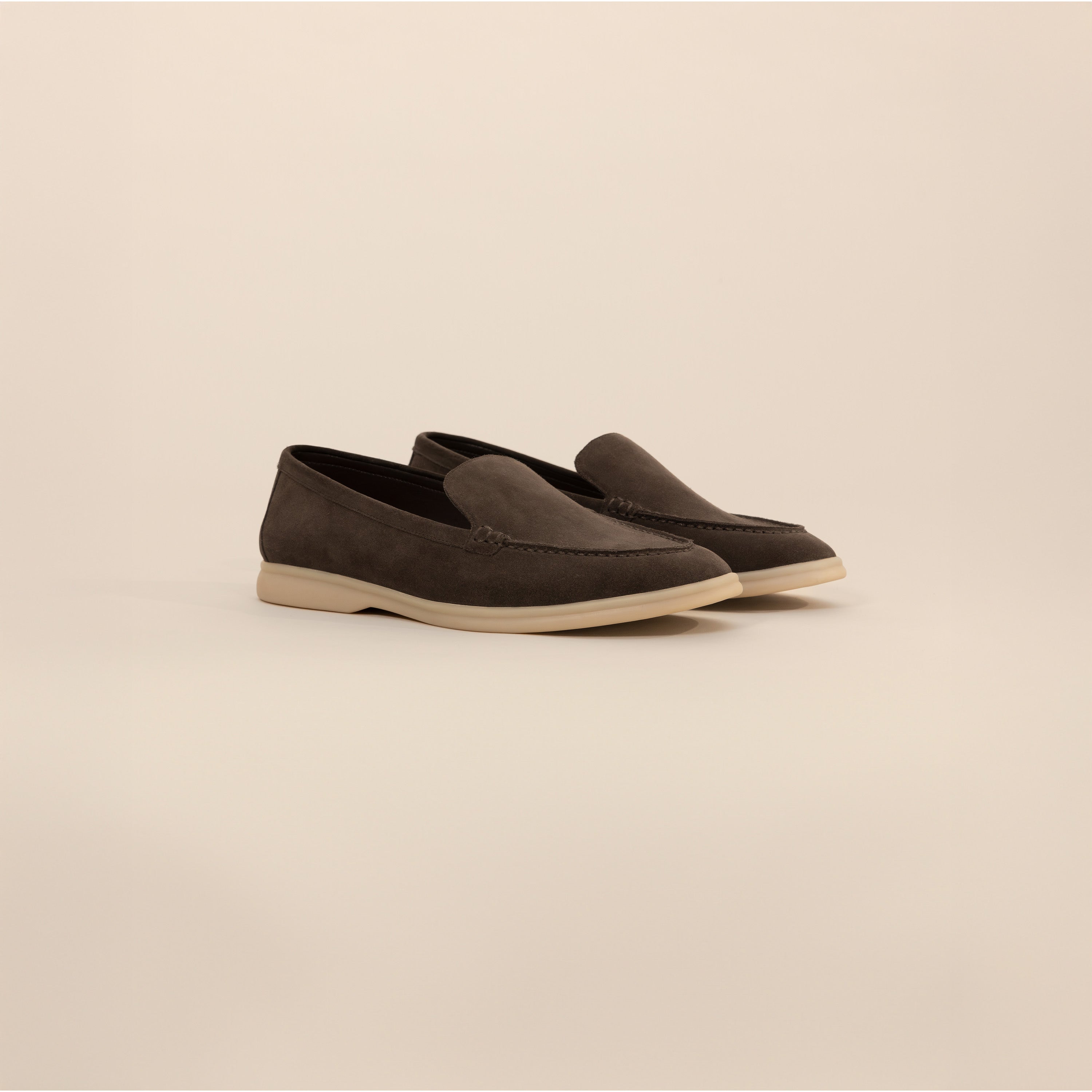 Man wearing Marame Suede Loafers in Burnt Brown, front view.