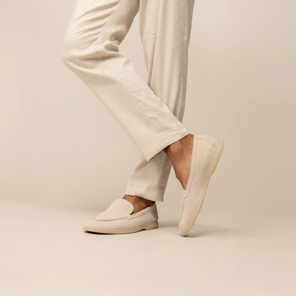 Man wearing Marame Suede Loafers in Grey, front view.