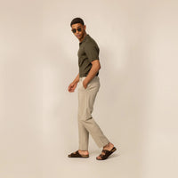 Man wearing Marame Classic Tapered Chinos in Almond Taupe, full view | almond taupe