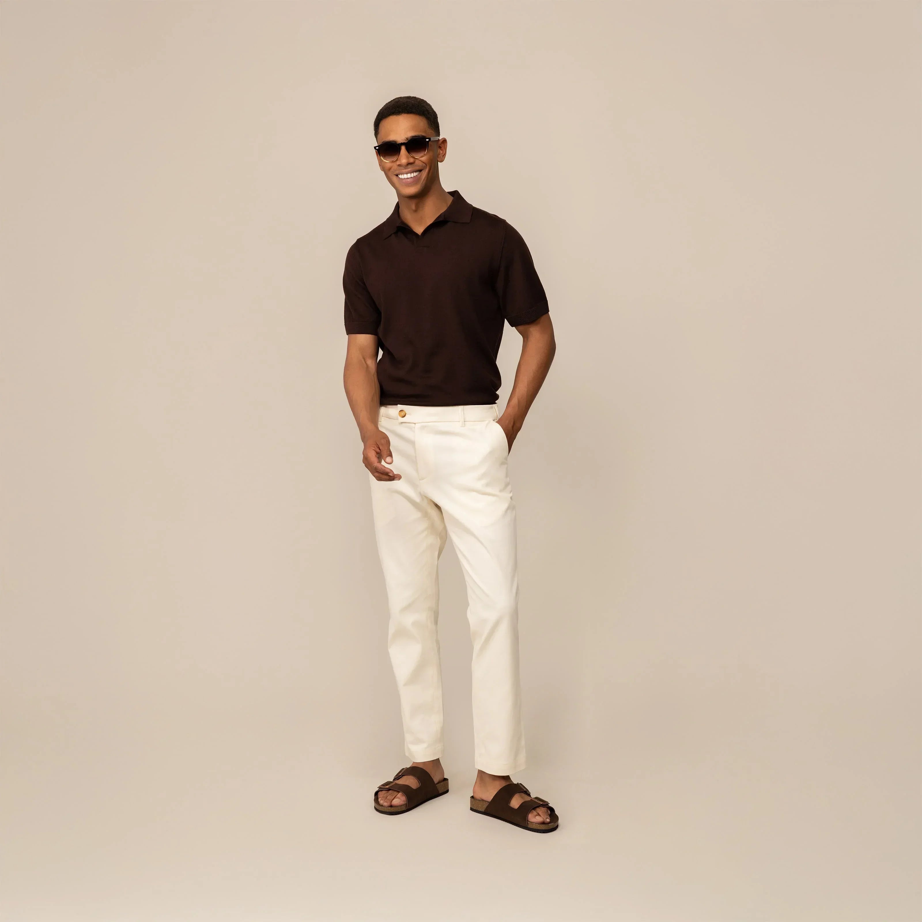 Man wearing Marame Tapered Chinos in Ivory Stone, front view |ivory stone
