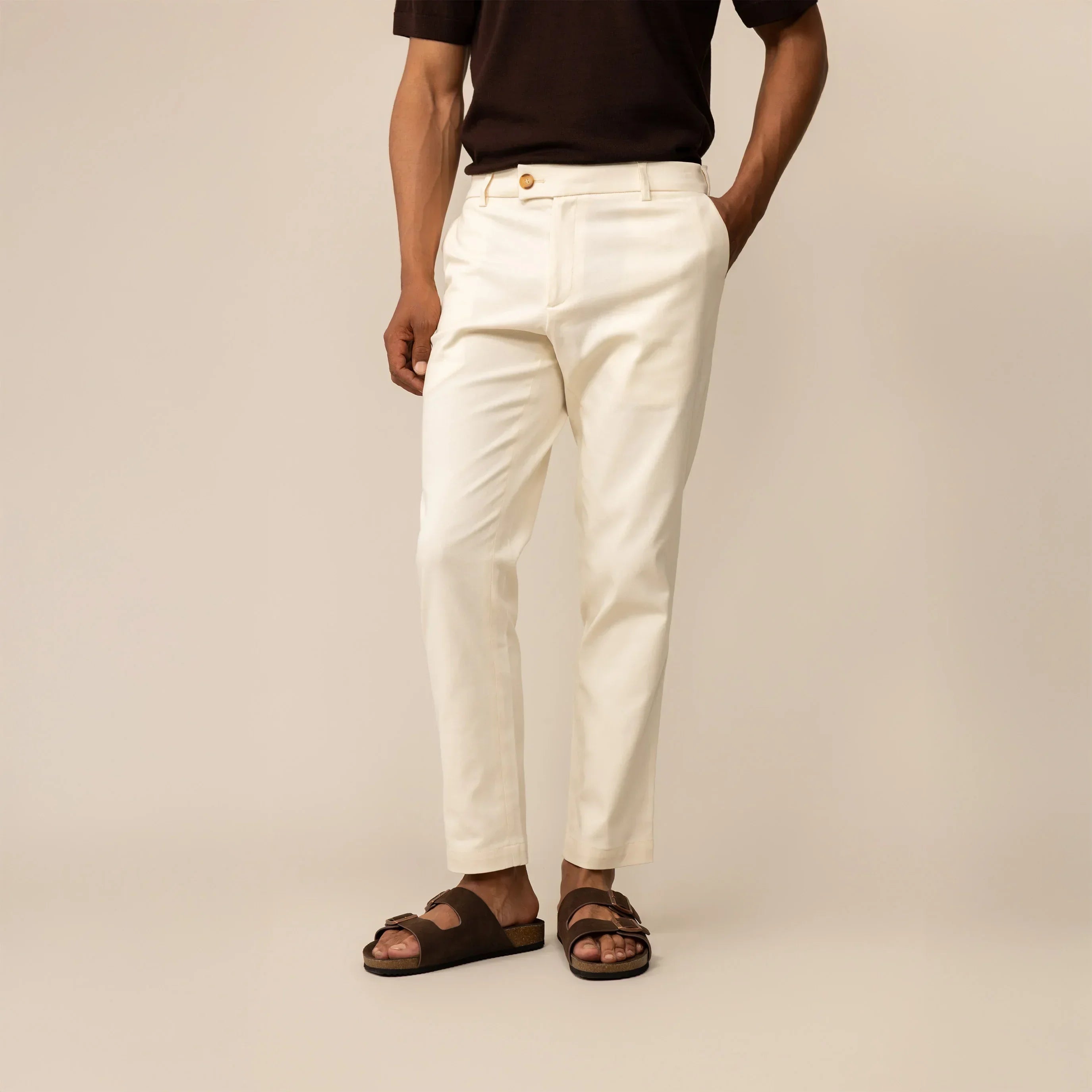 Man wearing Marame Tapered Chinos in Ivory Stone, front view |ivory stone