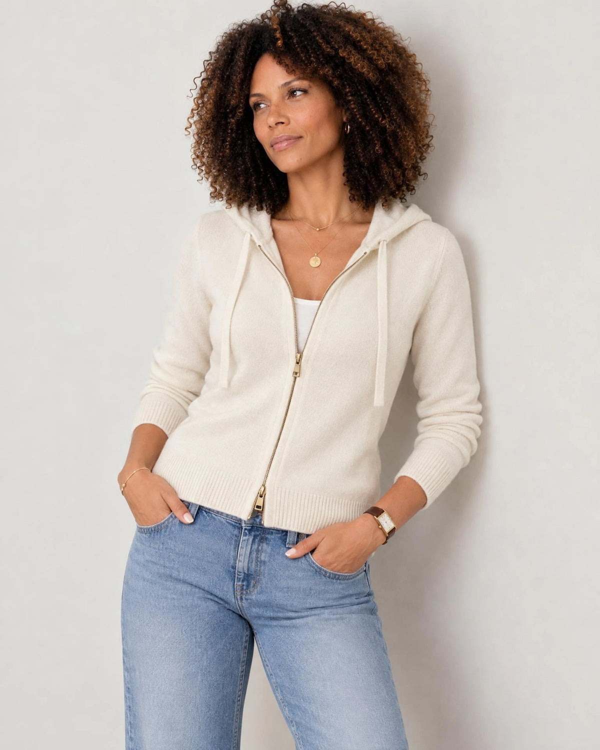 
The Noa Cashmere Blend Hooded Cardigan in Cream, front view on a model, styled with blue jeans