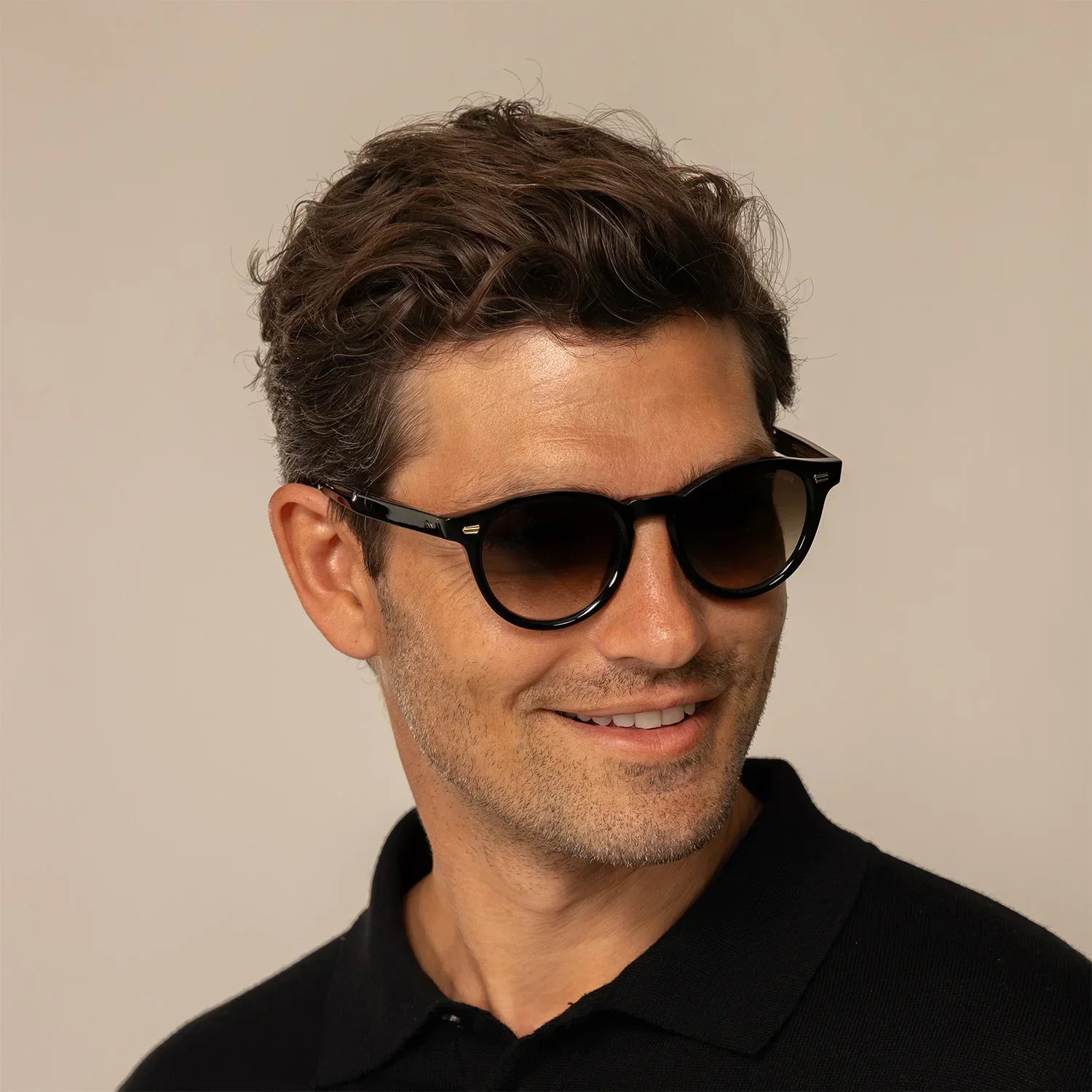 Man wearing Cutler and Gross Round Sunglasses 9378 in Black, front view.|black