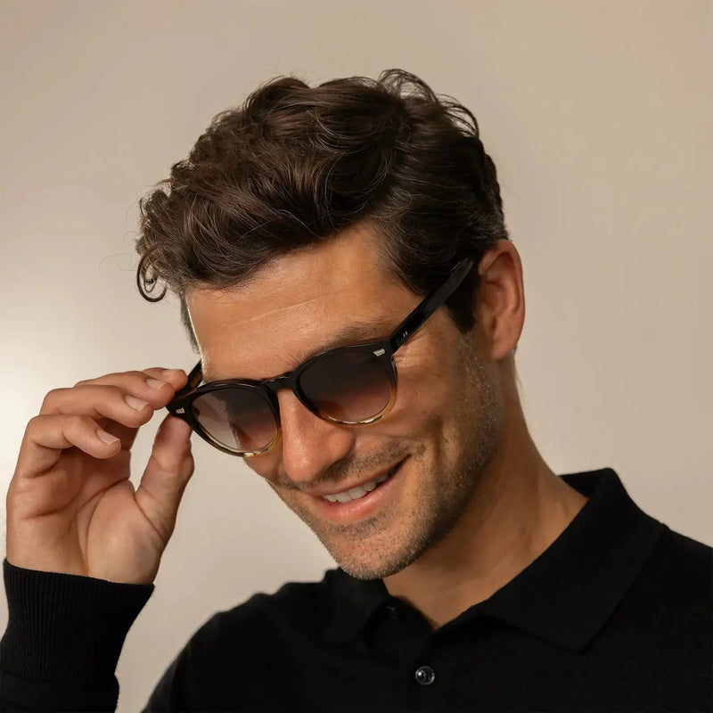 Man in Cutler and Gross Round Sunglasses 9378 in Honeyburst, front view.|honeyburst