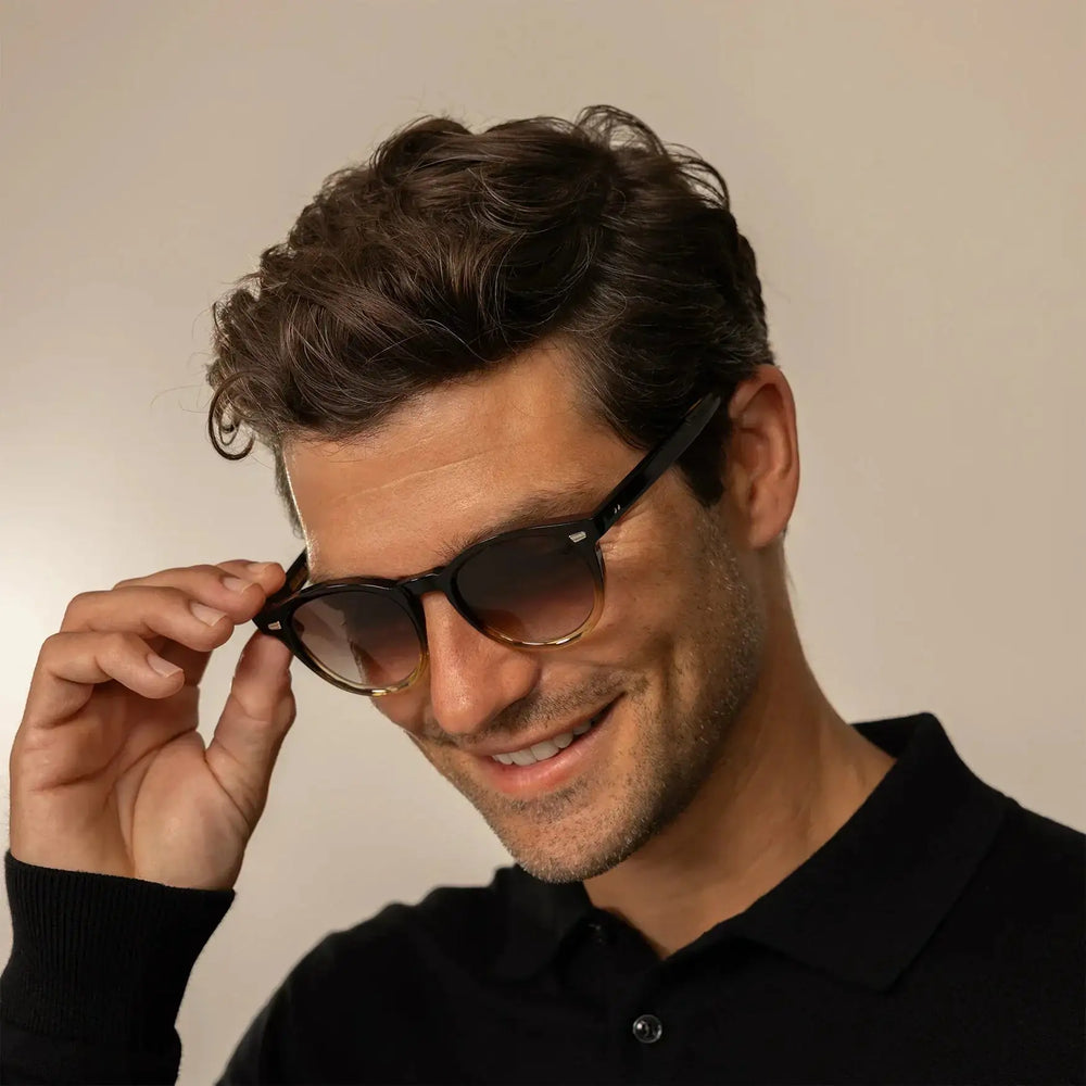 Man in Cutler and Gross Round Sunglasses 9378 in Honeyburst, front view.|honeyburst