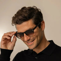 Man in Cutler and Gross Round Sunglasses 9378 in Honeyburst, front view.|honeyburst
