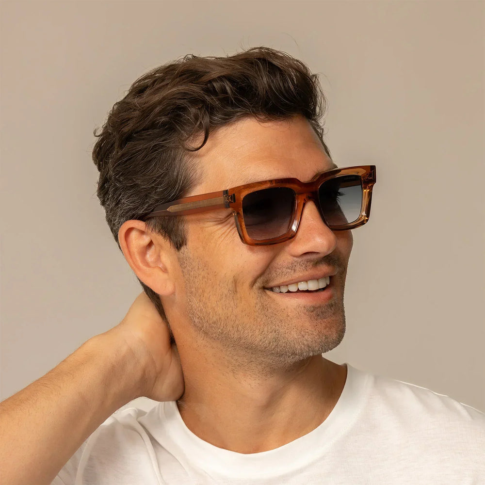 Man wearing Cutler and Gross Square Sunglasses 1386 in Crystal Peach, front view.