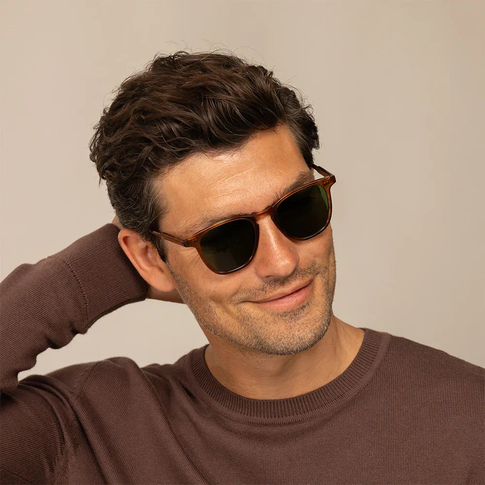 Man wearing Garrett Leight Brooks Sun Sunglasses in Pacific Teak, front view.