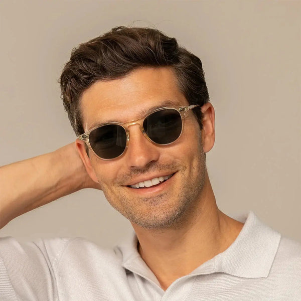 Man wearing Garrett Leight Hampton Sun Sunglasses in Pure Glass, front view.|pure glass