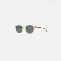 Garrett Leight Hampton Sun Sunglasses in Pure Glass, side view.
