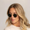 Woman wearing Garrett Leight Hampton Sun Sunglasses in Pure Glass, front view.|pure glass