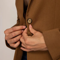 Woman wearing a Classic Blazer in Brown Toffee, detail.