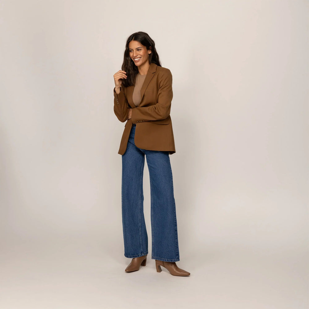 Woman wearing a Marame Classic Blazer in Brown Toffee, full view. |brown toffee