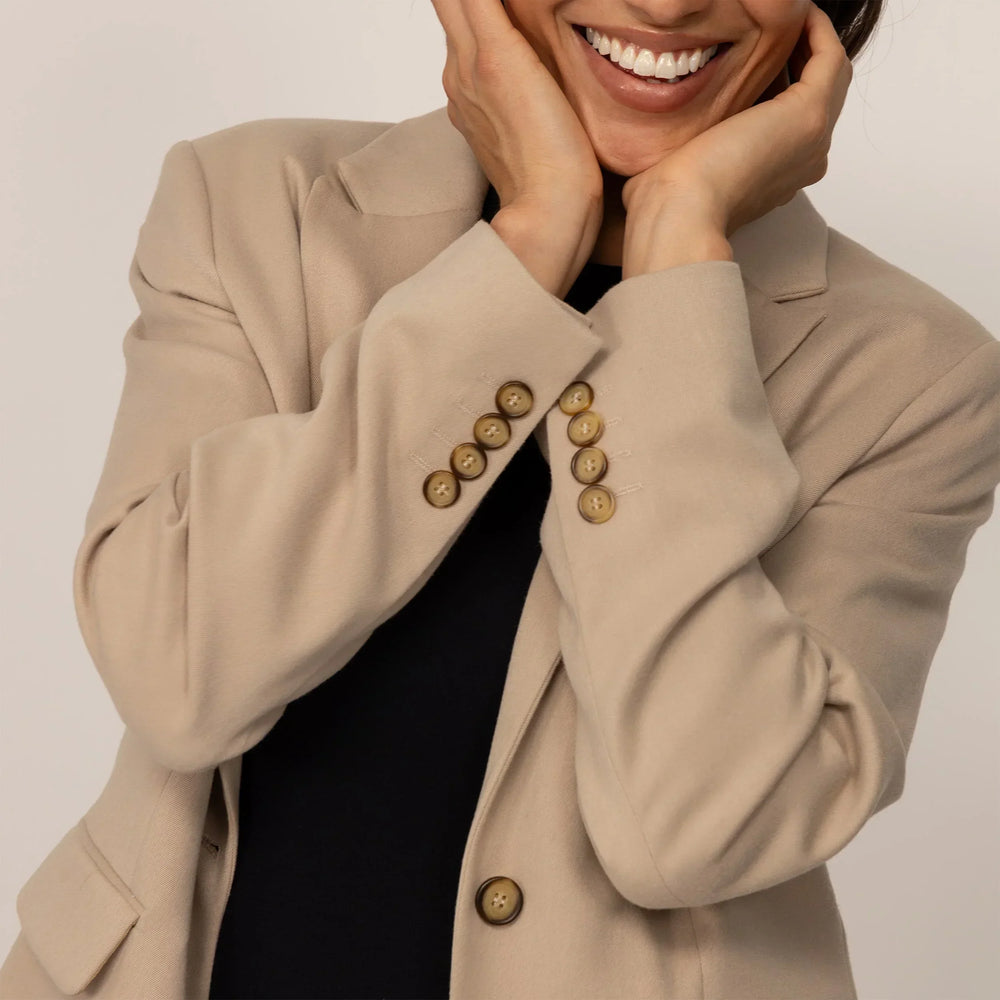 Woman wearing a Classic Blazer in Natural Beige, detail.