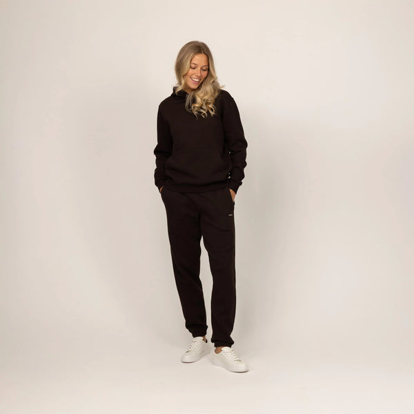 Woman wearing Marame cotton fleece hoodie in Smoked Brown, full view.|smoked brown