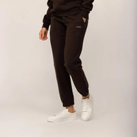 Woman wearing Marame cotton fleece Joggers in Smoked Brown, front view.|smoked brown