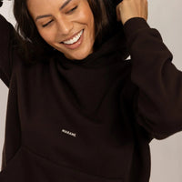 Woman wearing Marame cotton fleece Logo Hoodie in Smoked Brown, closeup.|smoked brown