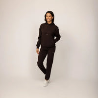 Woman wearing Marame cotton fleece Logo Hoodie in Smoked Brown, full view.