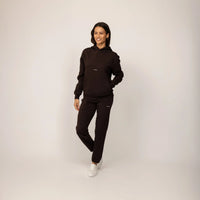 Woman wearing Marame cotton fleece Logo Hoodie in Smoked Brown, full view.|smoked brown