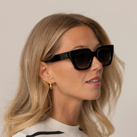 Women wearing Cutler and Gross Square Sunglasses 1422 in Black, front view.