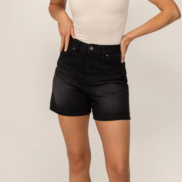 Woman wearing Denim Shorts in Black Wash Denim, front view.