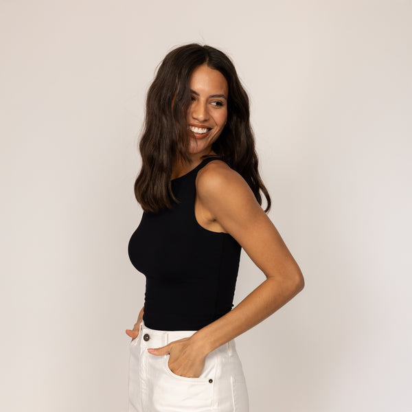 Woman wearing Double Layer Fitted Vest in Black, front view.