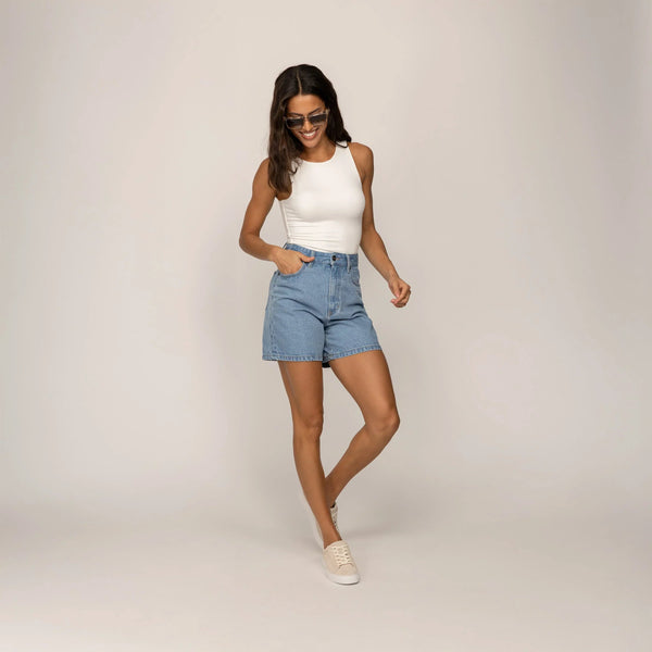 Woman wearing Marame Double Layer Fitted Vest in White, full view.|white