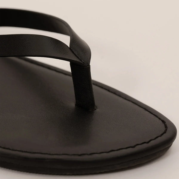 Marame Leather Flip Flops in Black, closeup.