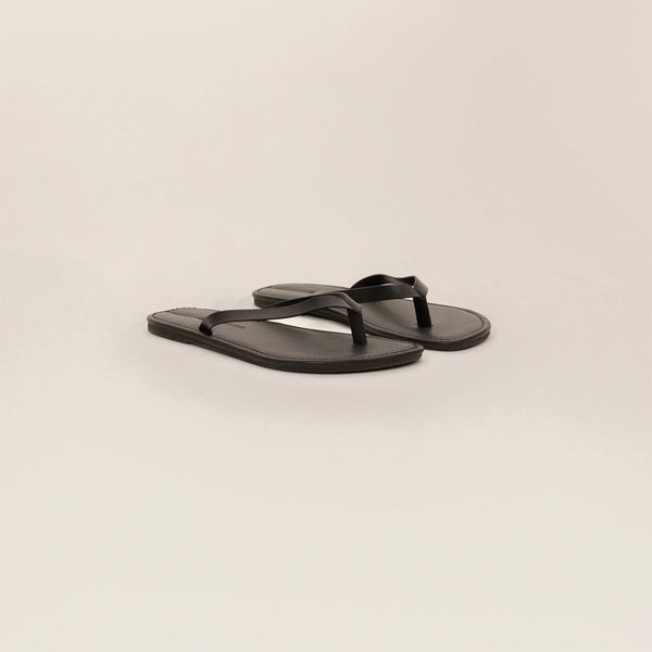Marame Leather Flip Flops in Black, front view.