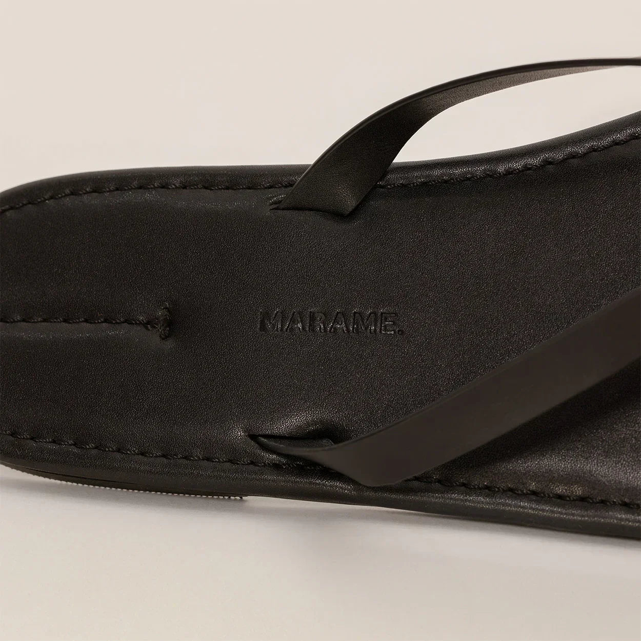 Marame Leather Flip Flops in Black, detail. |black