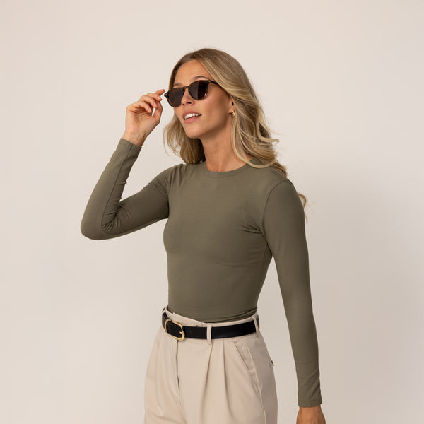 Woman wearing Long Sleeve Fitted T-Shirt in Autumn Khaki, front view.