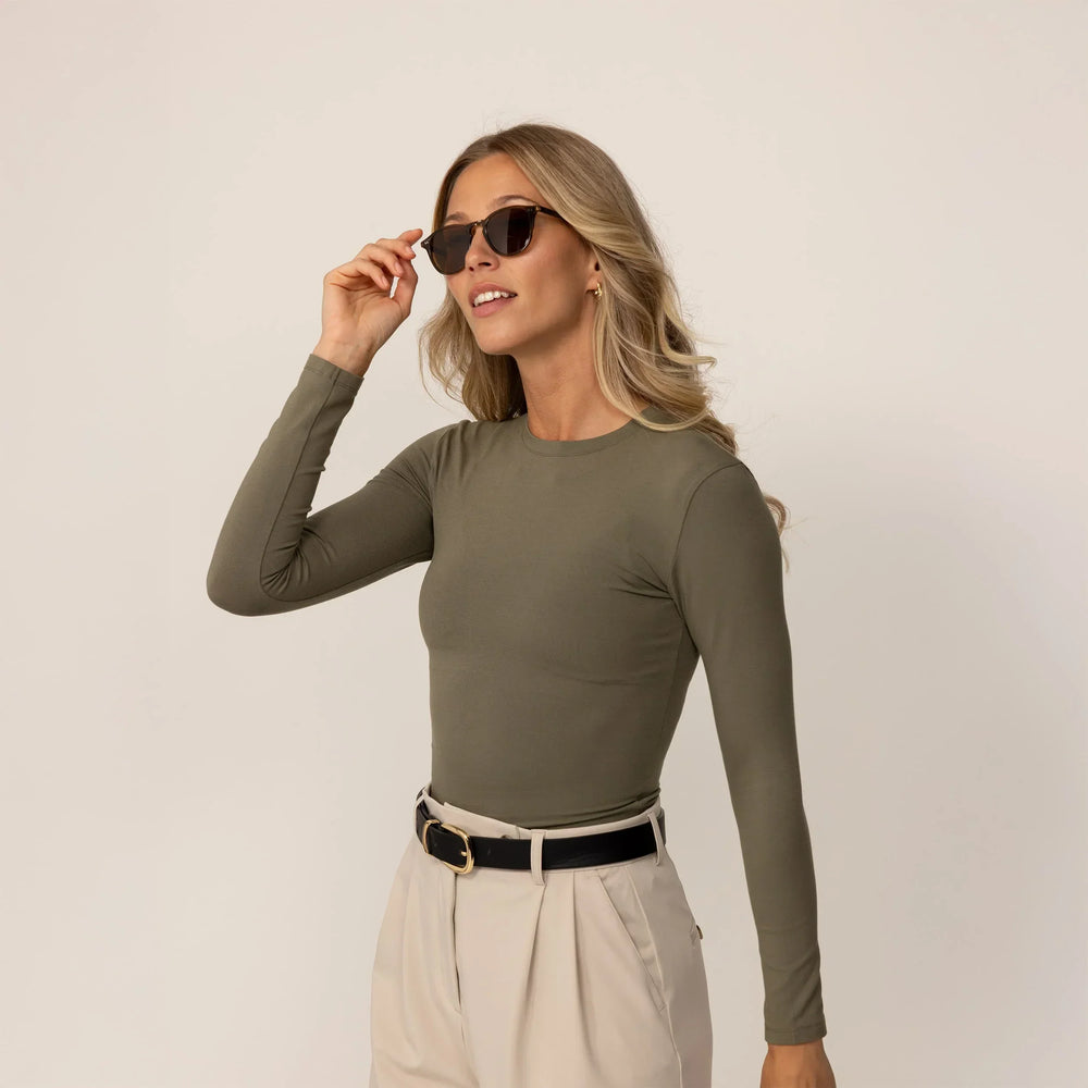 Woman wearing Long Sleeve Fitted T-Shirt in Autumn Khaki, front view.