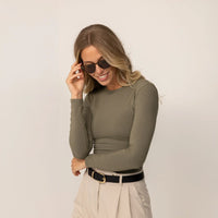 Woman wearing Marame Long Sleeve Fitted T-Shirt in Autumn Khaki, front view.