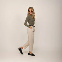 Woman wearing Marame Long Sleeve Fitted T-Shirt in Autumn Khaki, front view.
