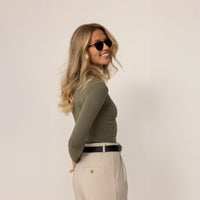 Woman wearing Marame Long Sleeve Fitted T-Shirt in Autumn Khaki, front view.
