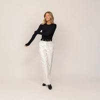 Woman wearing Marame Long Sleeve Fitted T-Shirt in Black, front view.