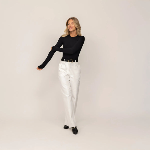 Woman wearing Marame Long Sleeve Fitted T-Shirt in Black, front view.|black