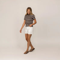 Woman wearing a Marame Regular Fit Striped T-Shirt in Ash Sand/White Snow, front view.