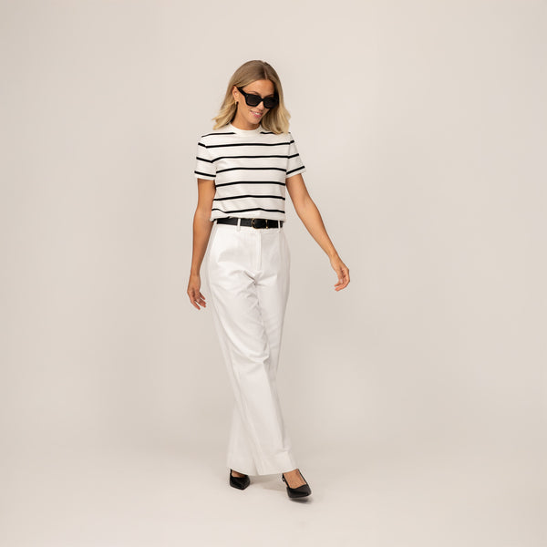 Woman wearing a Marame Regular Fit Striped T-Shirt in White Snow/Black, front view.