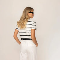 Woman wearing a Marame Regular Fit Striped T-Shirt in White Snow/Black, rear view.