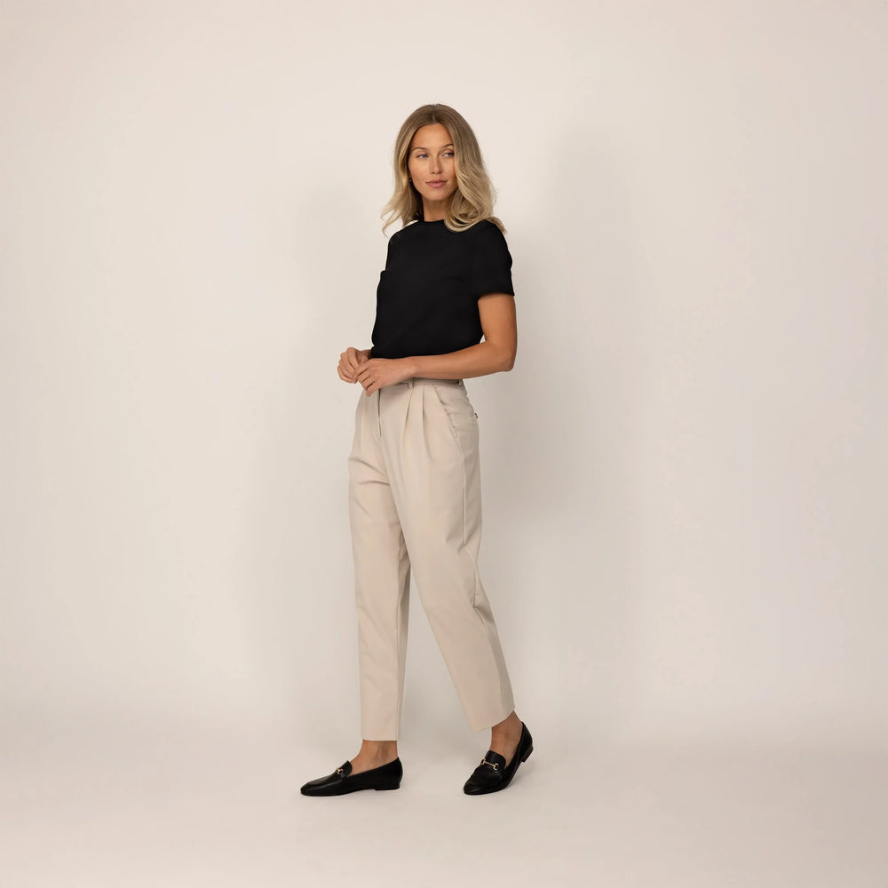 Woman wearing a Marame Regular Fit T-Shirt in Black, front view.