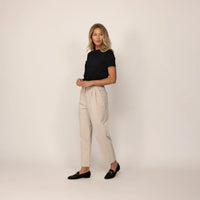 Woman wearing a Marame Regular Fit T-Shirt in Black, front view. |black