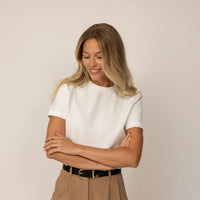 Woman wearing a Marame Regular Fit T-Shirt in White, front view.