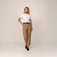 Woman wearing a Marame Regular Fit T-Shirt in White, front view.