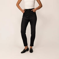 Woman wearing Marame Slim Leg Jeans in Black Wash Denim, front view. |black wash denim