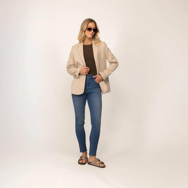 Woman wearing Marame Slim Leg Jeans in Deep Navy Wash Denim, full view. |deep navy wash denim