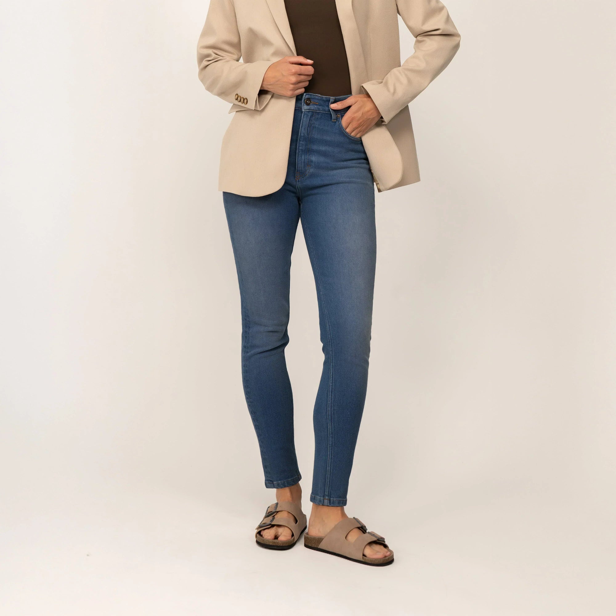 Woman wearing Marame Slim Leg Jeans in Deep Navy Wash Denim, front view. |deep navy wash denim