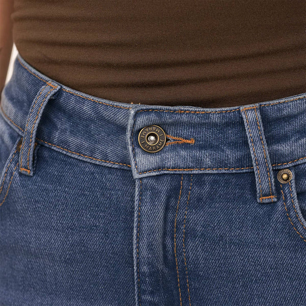 Woman wearing Marame Slim Leg Jeans in Deep Navy Wash Denim, detail.